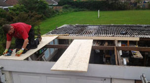 Preparing a flat roof for re-roofing